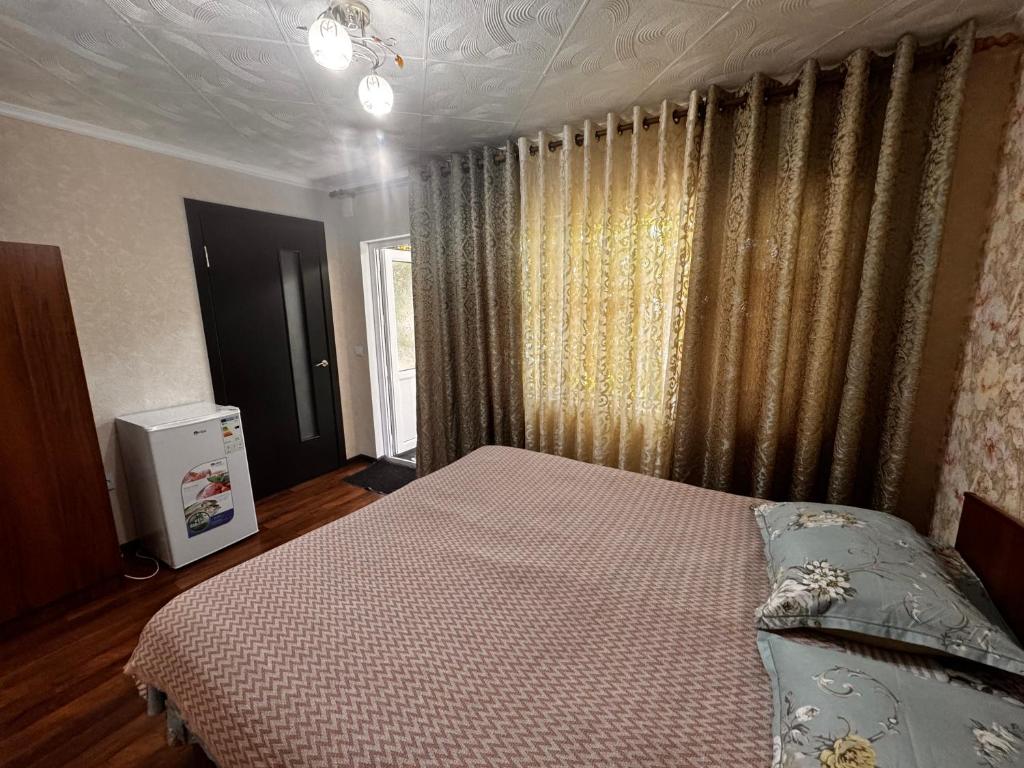Postel nebo postele na pokoji v ubytování Helena guest house