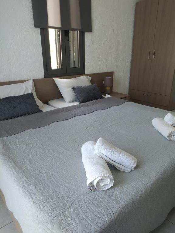 Postel nebo postele na pokoji v ubytování Lena Apartments
