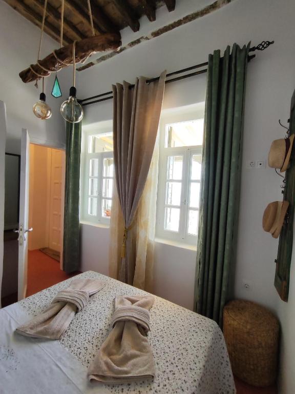Voodi või voodid majutusasutuse Vgena's house in Dio Choria toas