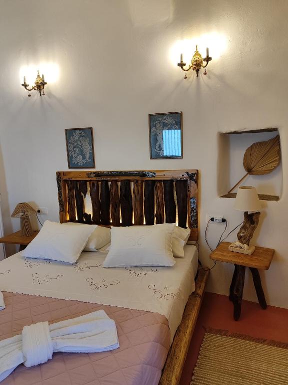Voodi või voodid majutusasutuse Vgena's house in Dio Choria toas