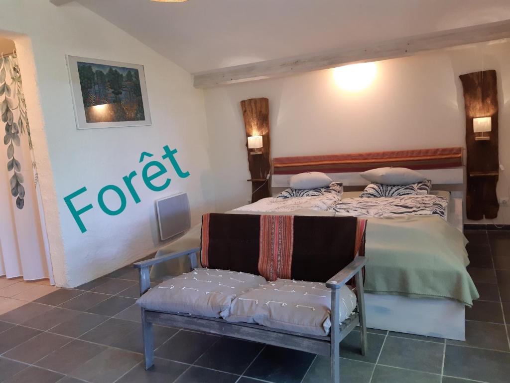 Postel nebo postele na pokoji v ubytování BnB Ferme Beauregard Les Pyrénées