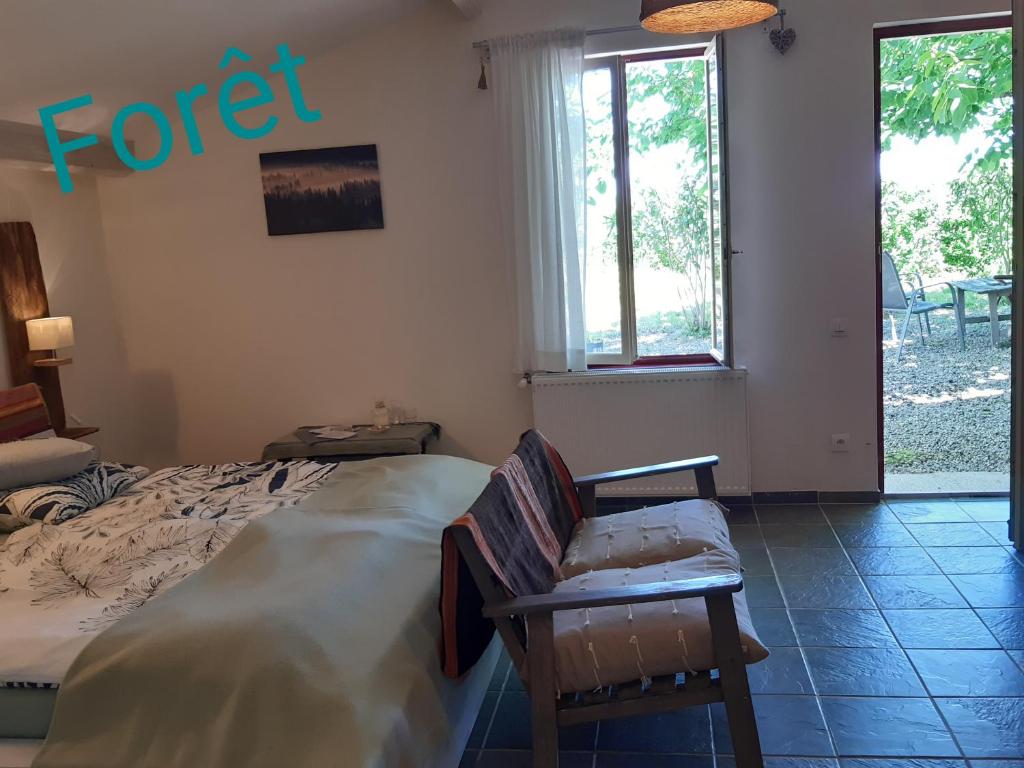 Postel nebo postele na pokoji v ubytování BnB Ferme Beauregard Les Pyrénées