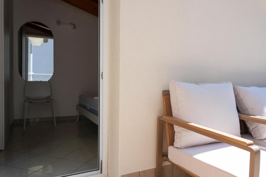 Łóżko lub łóżka w pokoju w obiekcie Dainese Apartments, Casa Abigail