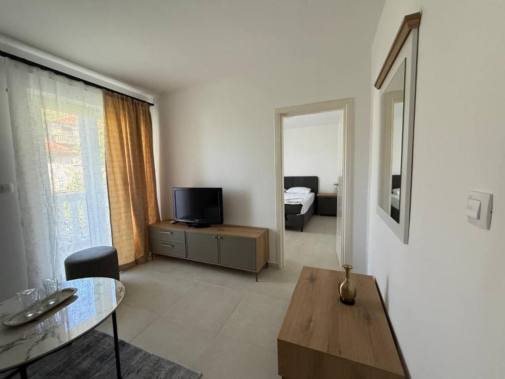 TV a/nebo společenská místnost v ubytování Hotel Xanadu