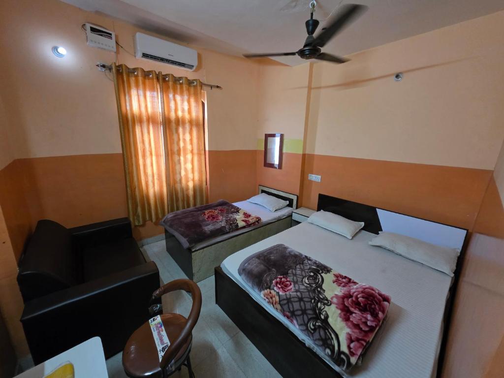 Postel nebo postele na pokoji v ubytování Hotel Welcome Nepal