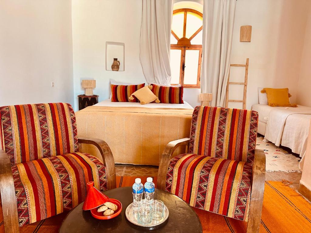 Postel nebo postele na pokoji v ubytování Riad Eucalyptus, Ethnic Hotel