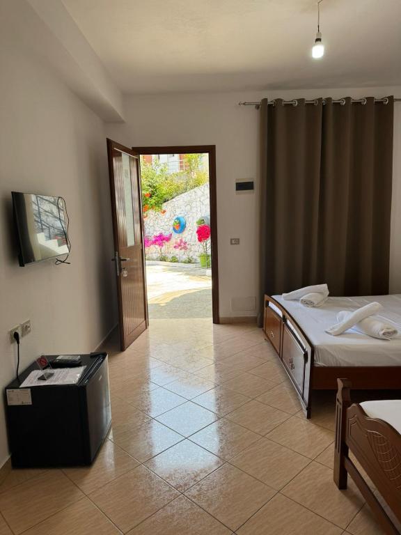 Postel nebo postele na pokoji v ubytování Aloha Villa and Suites