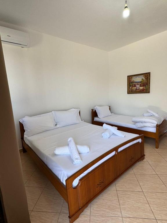 Postel nebo postele na pokoji v ubytování Aloha Villa and Suites