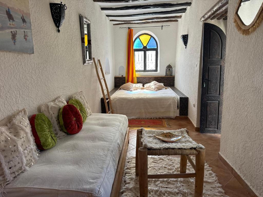 Postel nebo postele na pokoji v ubytování Riad Eucalyptus, Ethnic Hotel