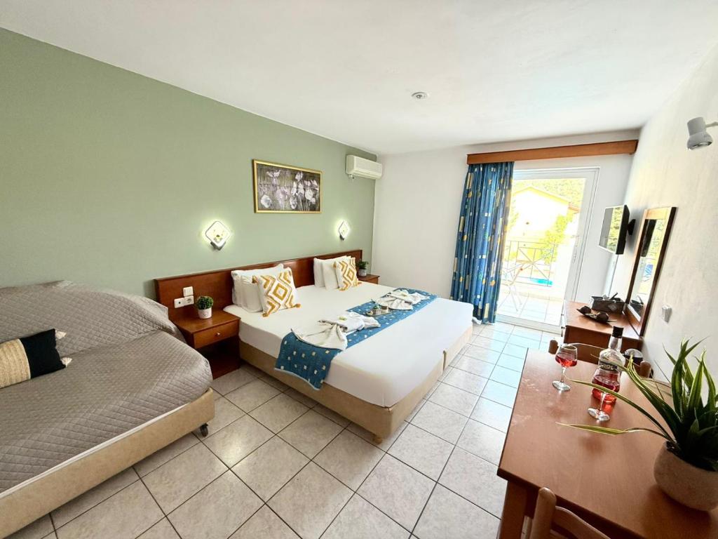 Postel nebo postele na pokoji v ubytování Melitsa corfu hotel