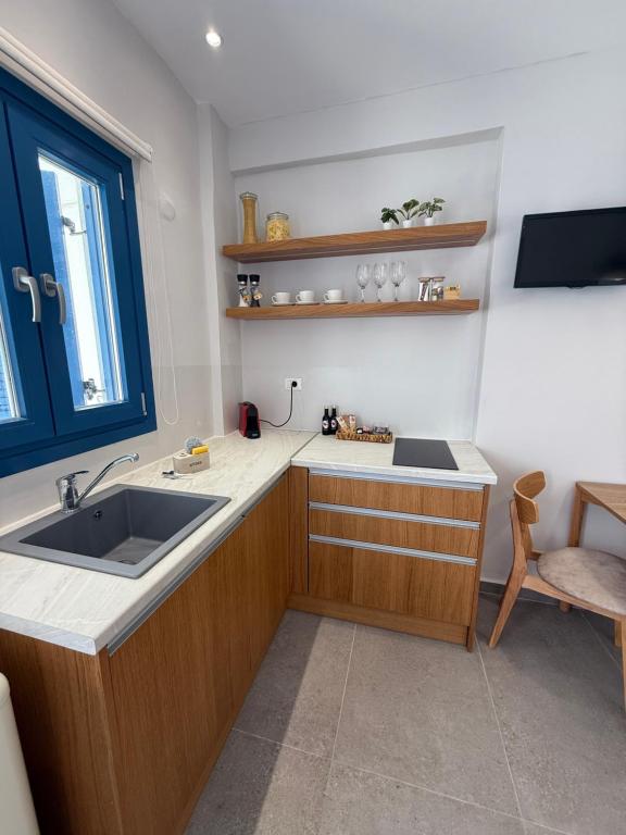 Kuchyň nebo kuchyňský kout v ubytování Panorama Rooms