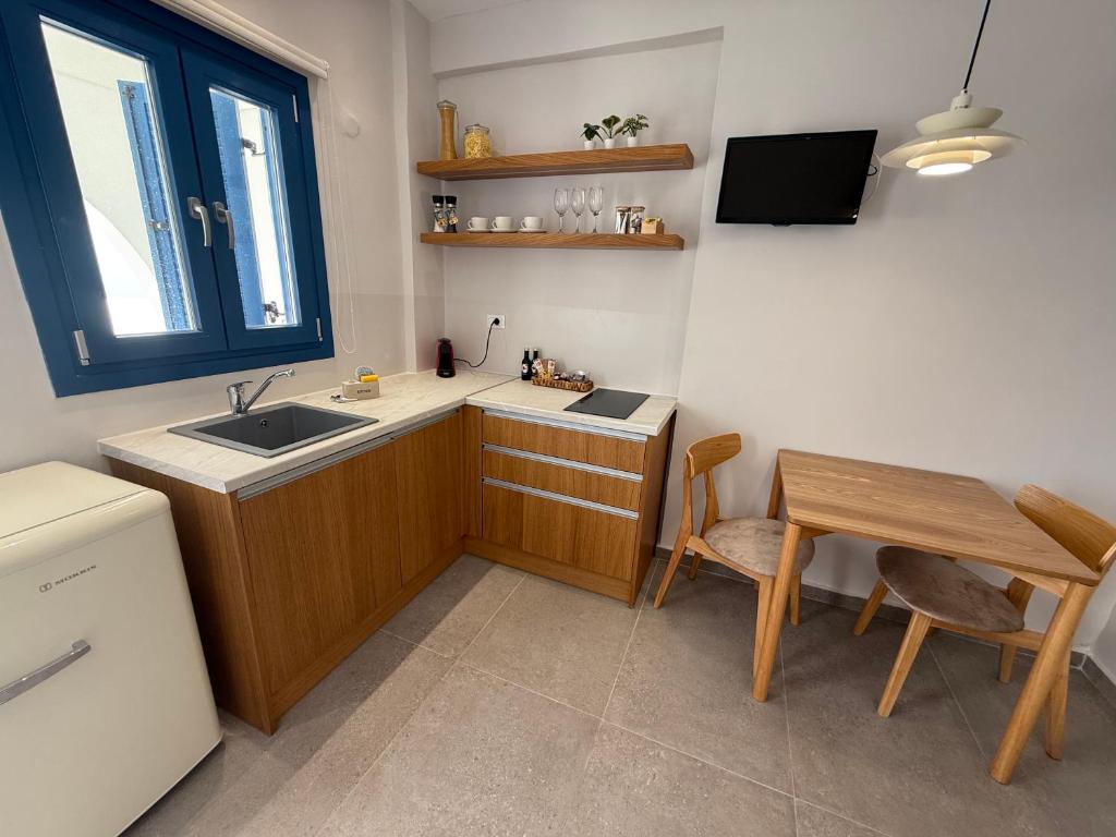 Kuchyň nebo kuchyňský kout v ubytování Panorama Rooms