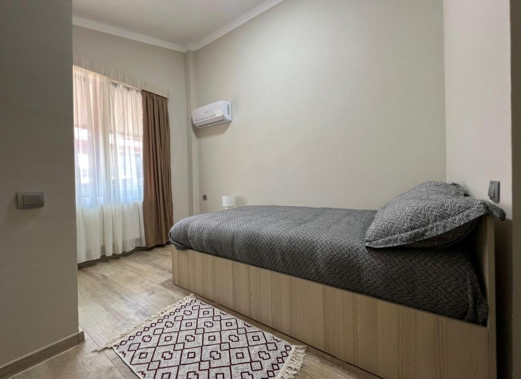 Postel nebo postele na pokoji v ubytování Eniseli