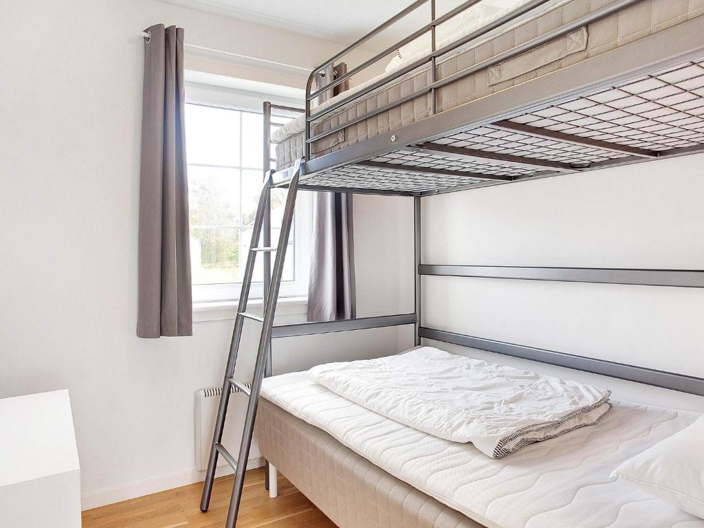 Postel nebo postele na pokoji v ubytování Læsø Seaside Holiday Homes