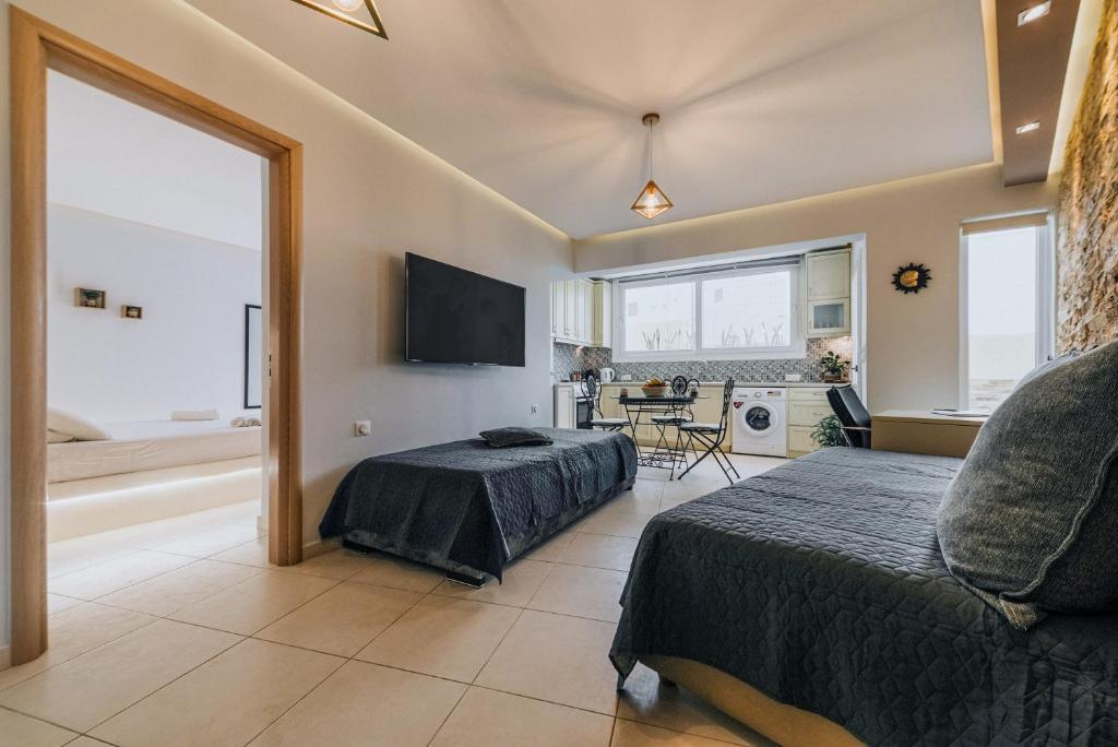 Televízia a/alebo spoločenská miestnosť v ubytovaní Aquarial Home