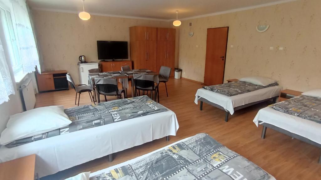 Postel nebo postele na pokoji v ubytování Twój Hostel Ruda Śląska
