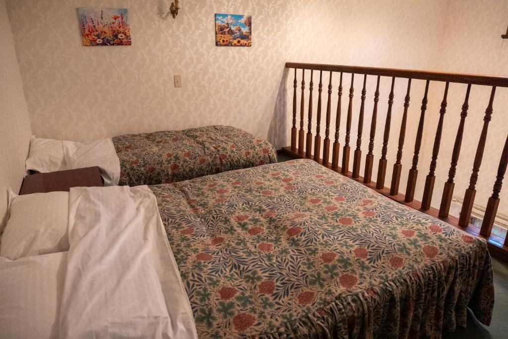 Postel nebo postele na pokoji v ubytování Pension Balmy