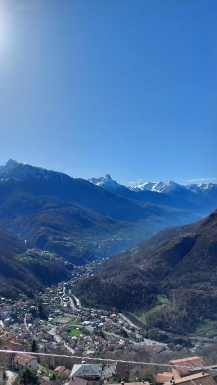 an aerial view of a town in the mountains at LA PANORAMICA Svegliati con la Vista delle Alpi dalle Camere e Terrazza Ampia in Berzo