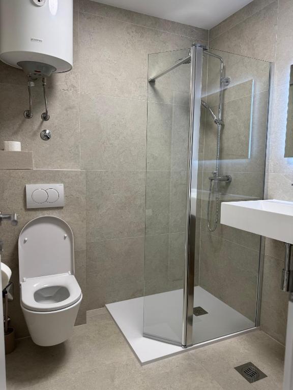 Kúpeľňa v ubytovaní Laganini Apartments