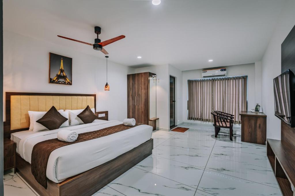 Postel nebo postele na pokoji v ubytování Mughal Suites