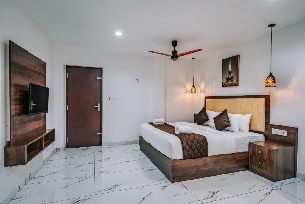 Postel nebo postele na pokoji v ubytování Mughal Suites