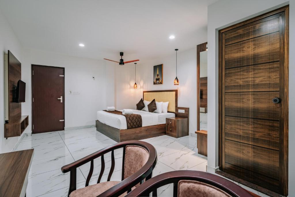 Postel nebo postele na pokoji v ubytování Mughal Suites