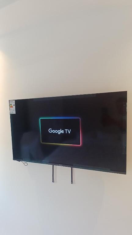 Televízia a/alebo spoločenská miestnosť v ubytovaní Antonio Hotel Amman