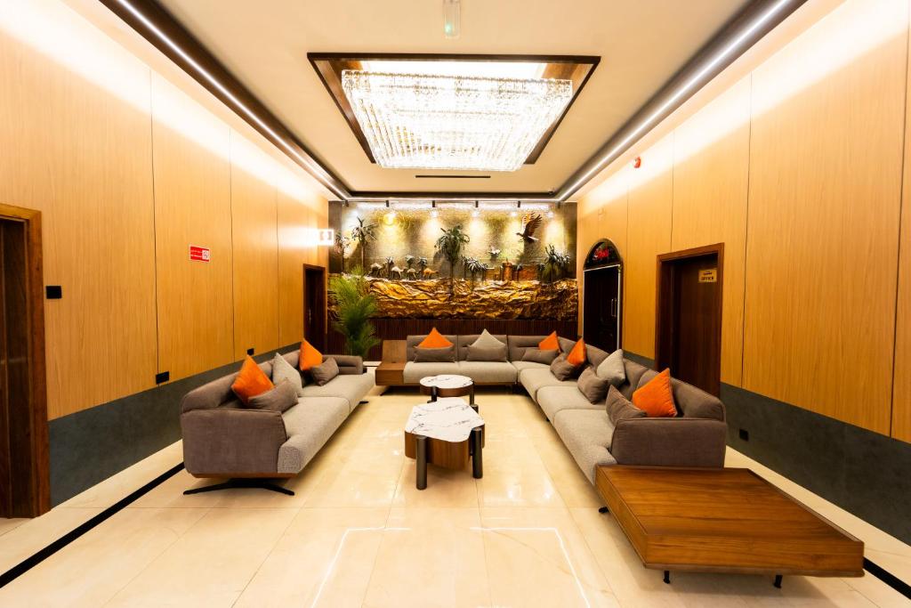 Posezení v ubytování Grand Astoria Hotel