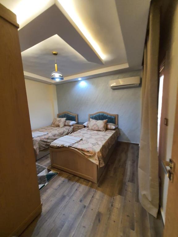 Voodi või voodid majutusasutuse عمارات ضباط مصطفى كامل toas