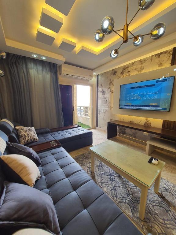 Televiisor ja/või meelelahutuskeskus majutusasutuses عمارات ضباط مصطفى كامل