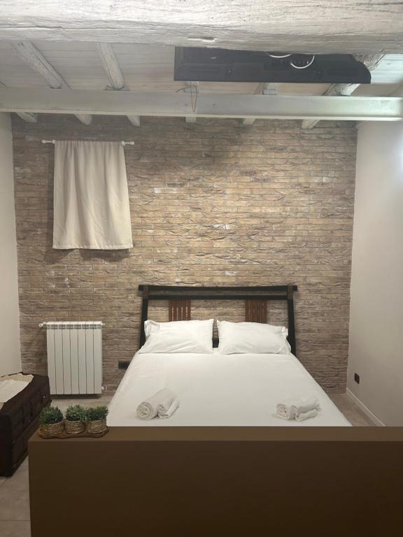 Postel nebo postele na pokoji v ubytování Bed & Breakfast La Rosa