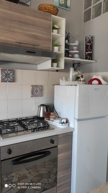 Kuchyň nebo kuchyňský kout v ubytování Casa di Ana