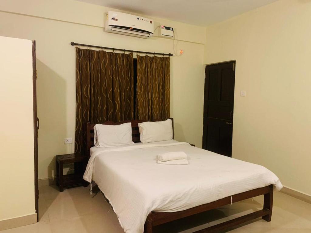 Postel nebo postele na pokoji v ubytování Mehar Rooms