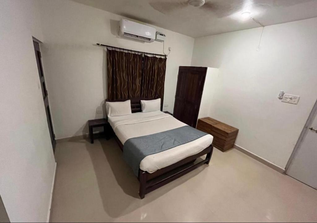Postel nebo postele na pokoji v ubytování Mehar Rooms