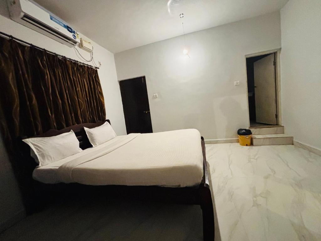 Postel nebo postele na pokoji v ubytování Mehar Rooms