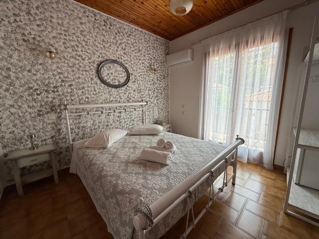 Postel nebo postele na pokoji v ubytování Corali rooms pelion