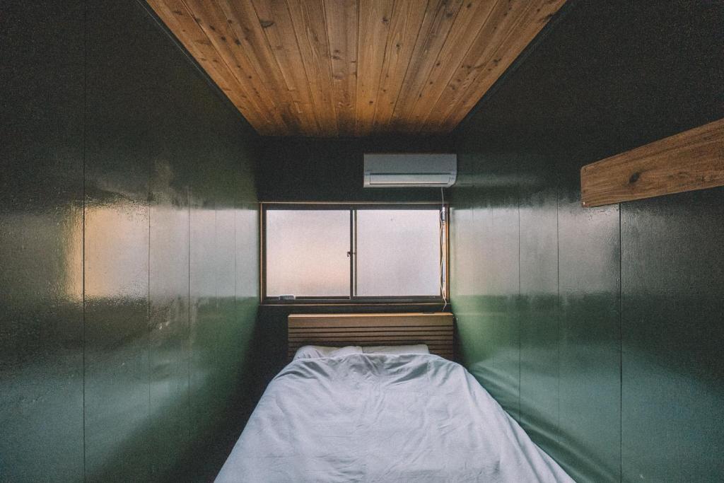 Postel nebo postele na pokoji v ubytování guesthouse TANDEM