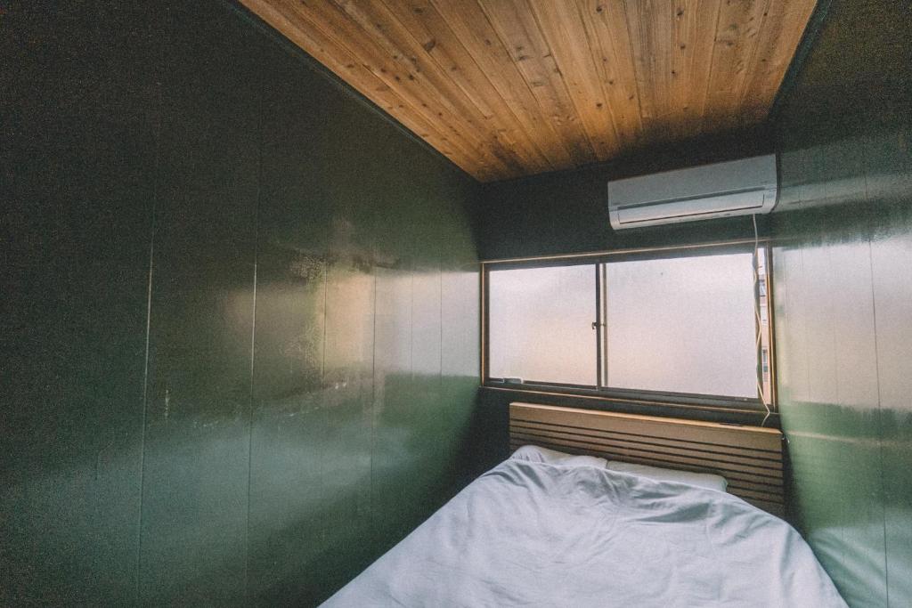 Postel nebo postele na pokoji v ubytování guesthouse TANDEM