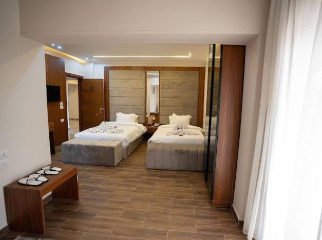 Postel nebo postele na pokoji v ubytování Browns pyramids iNN