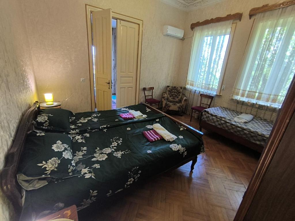 Postel nebo postele na pokoji v ubytování Guest House Livia