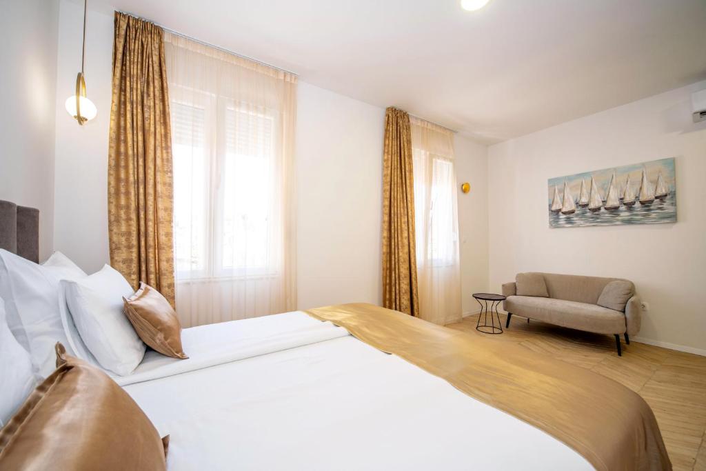 Postel nebo postele na pokoji v ubytování Mariani luxury rooms in center