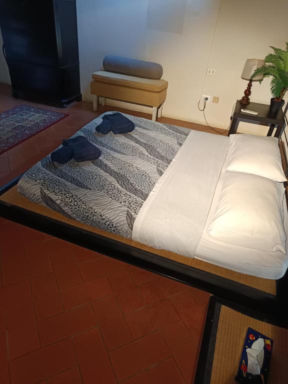 A bed or beds in a room at Panoramic Suite near Duomo and Station