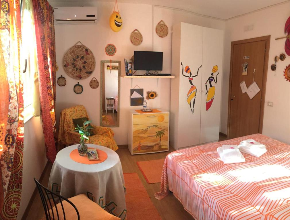 Postel nebo postele na pokoji v ubytování B&B Magna Grecia