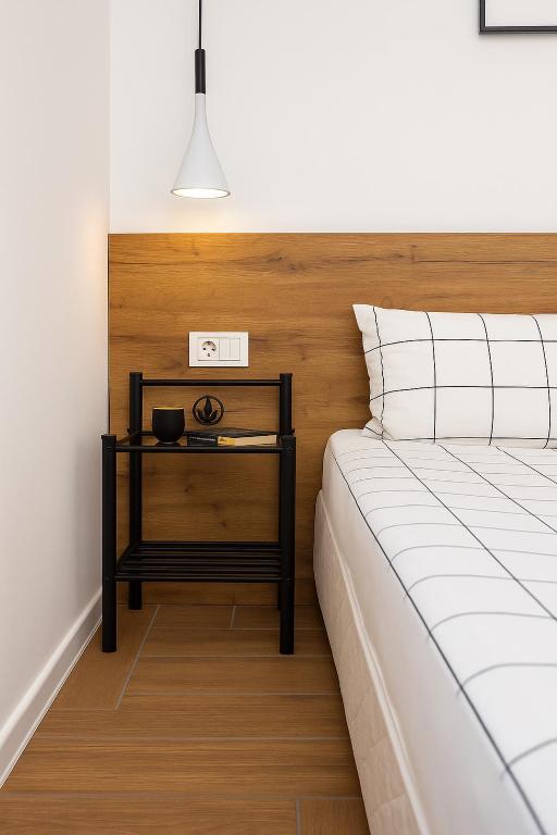 Postel nebo postele na pokoji v ubytování Cozy and comfortable northern apartment, Kapana district, Plovdiv, Center