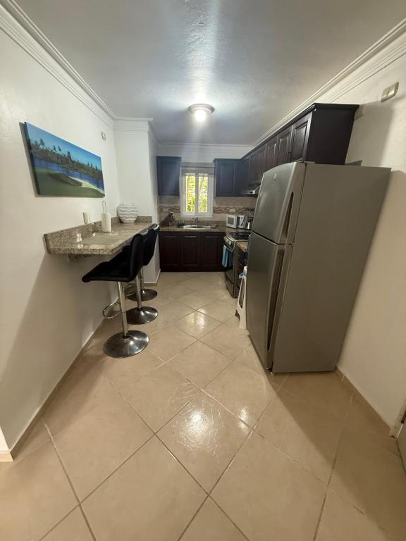 Kuchyň nebo kuchyňský kout v ubytování Garden Condos 26