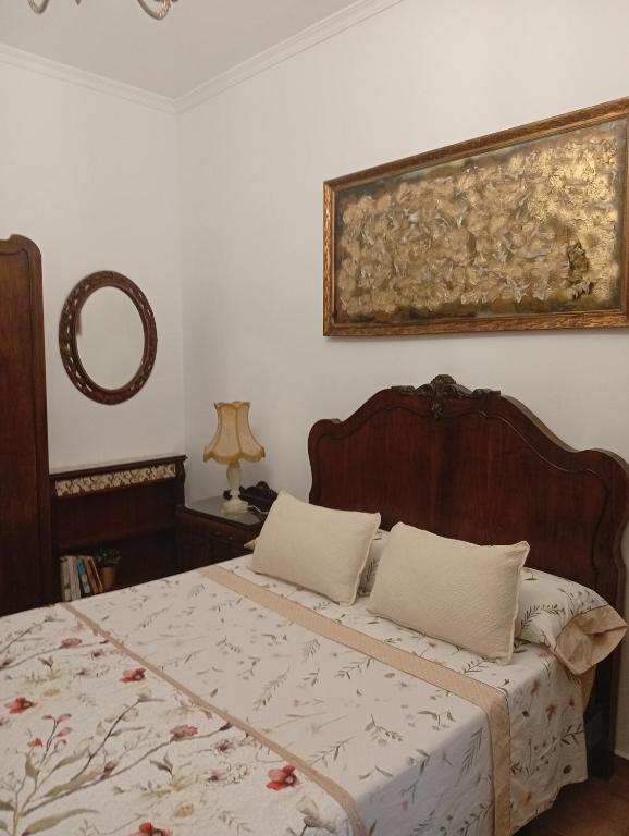 Cama o camas de una habitación en Casa Rural en San Carlos del Valle- Doña Gumersinda