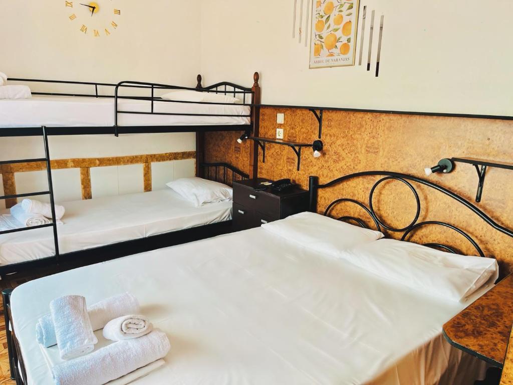 Postel nebo postele na pokoji v ubytování Hotel Holiday