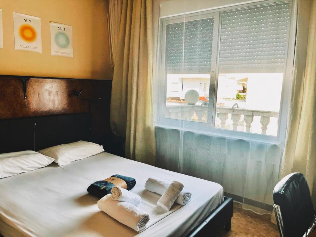 Postel nebo postele na pokoji v ubytování Hotel Holiday