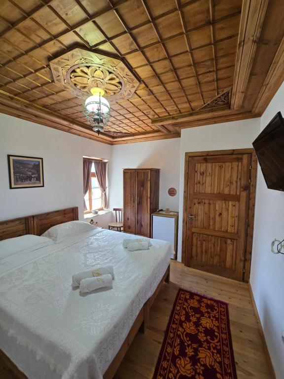 Postel nebo postele na pokoji v ubytování Guest House J.Prifti