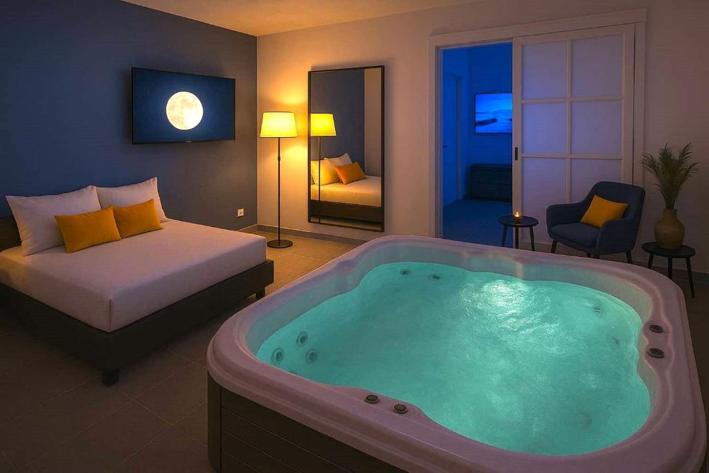 Postel nebo postele na pokoji v ubytování Alchimia Luxury Suites